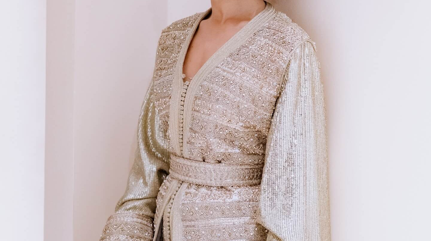 Luxury Moroccan caftan online - White embroidered takchita with golden sfifa details