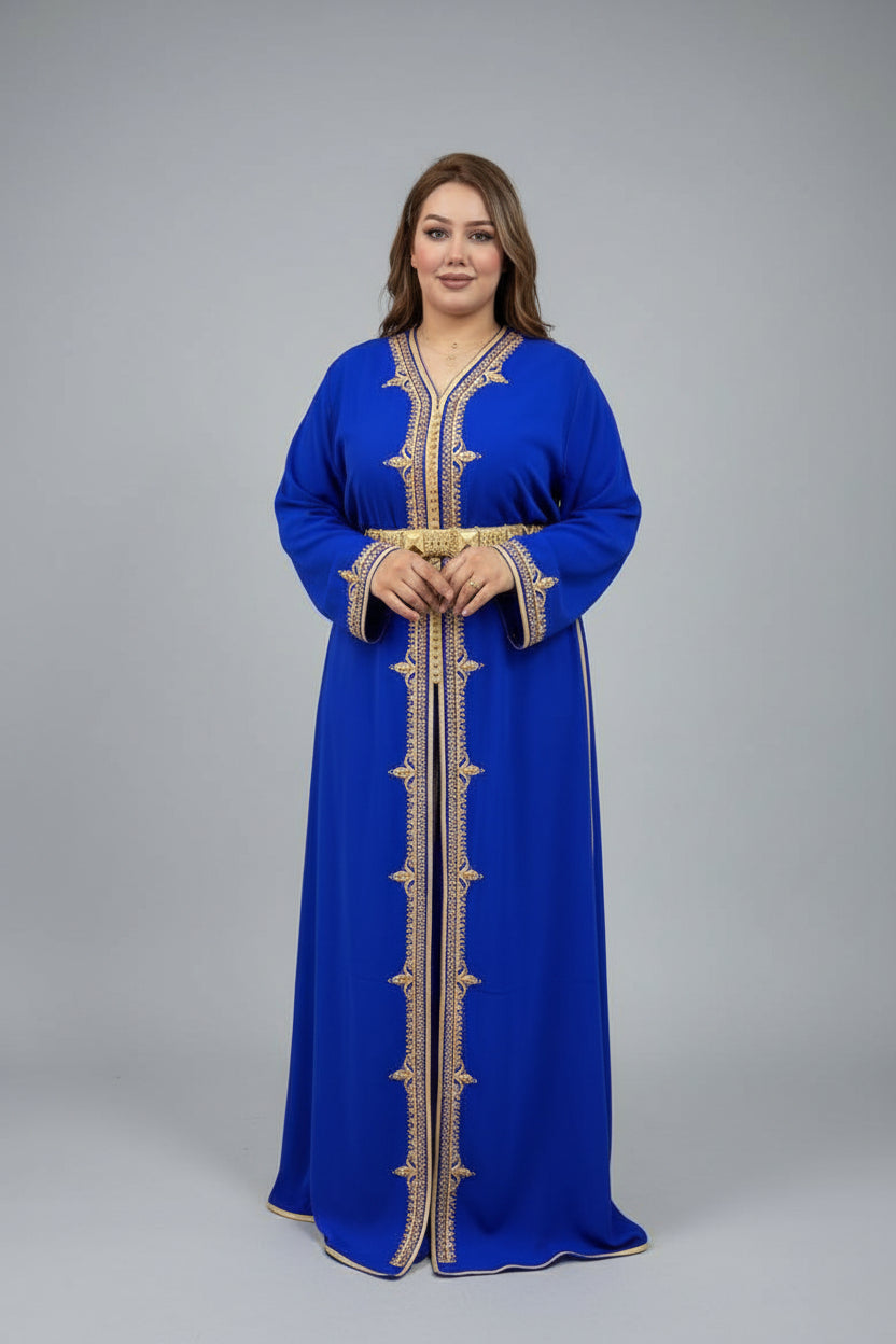 Woman wearing a blue dress with gold embroidery in a clothing store."caftan dress"
"women's caftan"
"kaftan"
"cotton caftan"
"caftan moroccan"
"moroccan caftan"
"men's caftan"
"caftan for women"
"white caftan"
"blue caftan"
"what is caftan"
"caftan dresses"
"caftan men"
"silk caftan"
"vintage caftan"
"maxi dress"
"beach caftan"
"caftan maxi dress"
"caftan for men"
"what is a caftan"
"caftan cover up"
"kaftan dress"
"plus size caftan"
"caftan plus size"
"short caftan"
"linen caftan"
"womens caftan"
