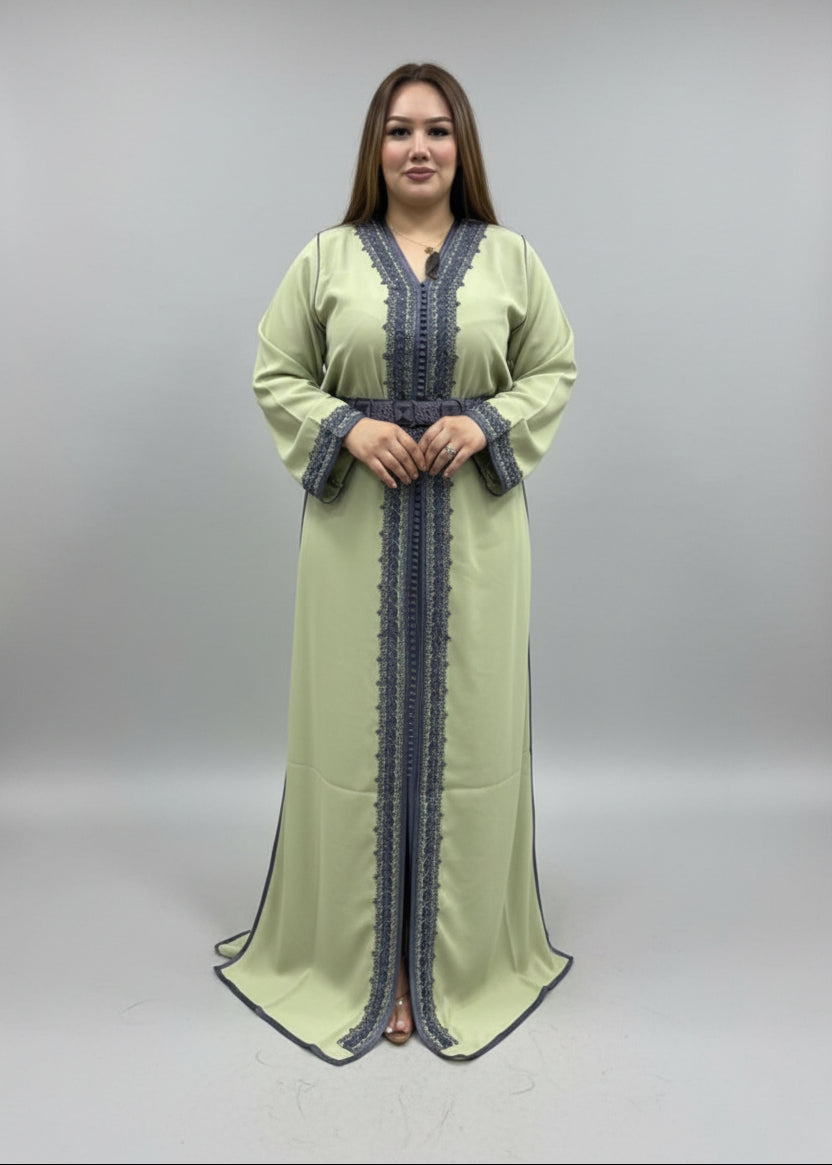 Woman wearing a green dress with intricate detailing in a clothing store.
"caftan dress"
"women's caftan"
"kaftan"
"cotton caftan"
"caftan moroccan"
"moroccan caftan"
"men's caftan"
"caftan for women"
"white caftan"
"blue caftan"
"what is caftan"
"caftan dresses"
"caftan men"
"silk caftan"
"vintage caftan"
"maxi dress"
"beach caftan"
"caftan maxi dress"
"caftan for men"
"what is a caftan"
"caftan cover up"
"kaftan dress"
"plus size caftan"
"caftan plus size"
"short caftan"
"linen caftan"
"womens caftan"