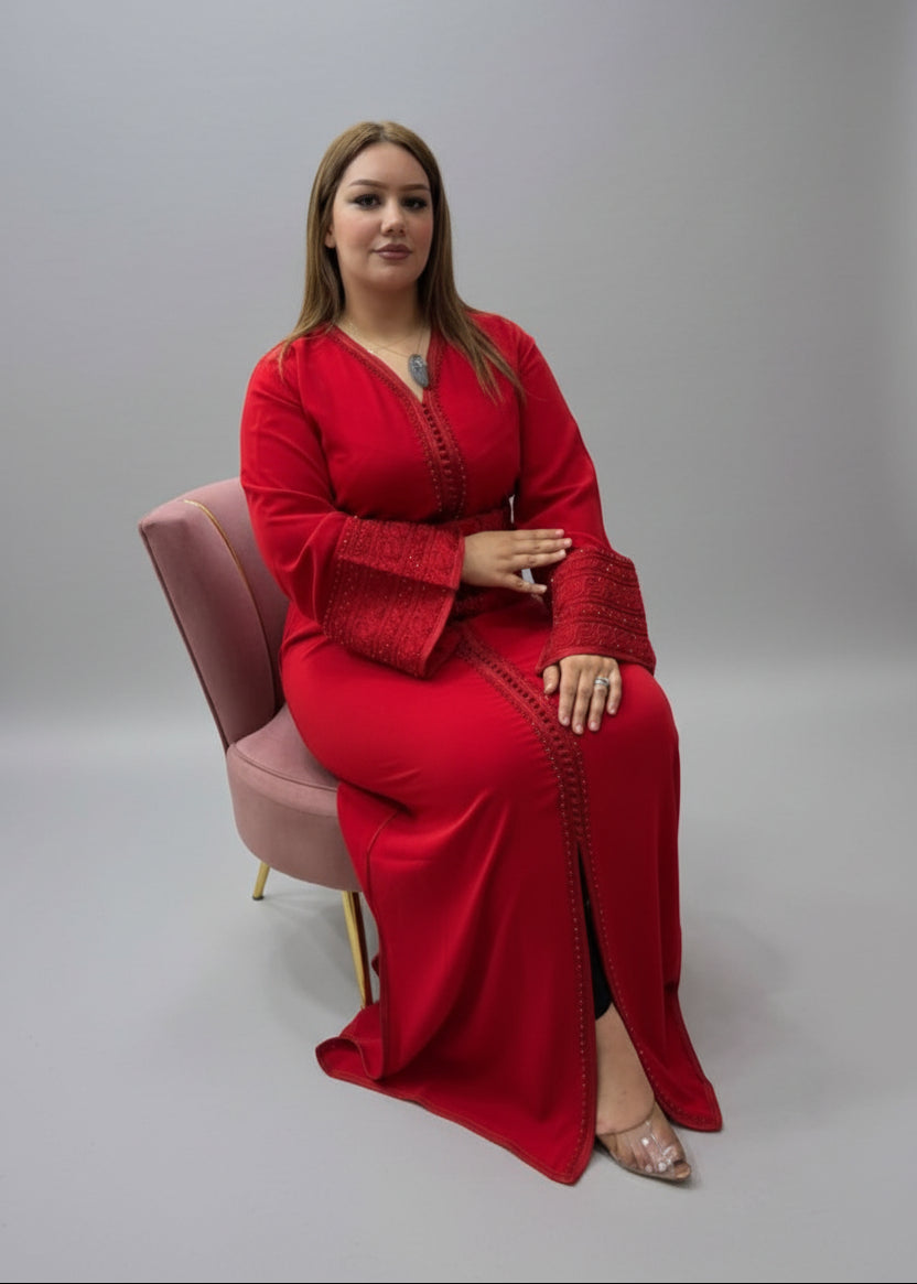 Woman in a red outfit sitting in a store with fabric on shelves in the background
"kaftan dress""
"kaftan dresses"
"women kaftan"
"kaftan women"
"black kaftan"
"kaftan for women"
"men's kaftan"
"maxi kaftan"
"kaftan set"
"long kaftan"
"white kaftan"
"kaftan maxi dress"
"cotton kaftan"
"silk kaftan"
"blue kaftan"
"kaftan men"
"men kaftan"
"what is kaftan"
"caftan"
"moroccan kaftan"
"kaftan moroccan"
"kaftan top"
"embroidered kaftan"
"black kaftan dress"
"long kaftan dress"
"linen kaftan"
"abaya"