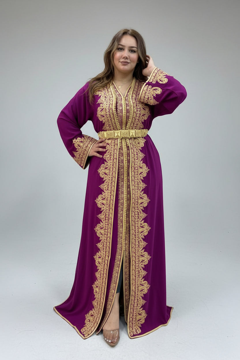 Woman wearing a purple dress with gold embroidery in a clothing store.
"caftan dress"
"women's caftan"
"kaftan"
"cotton caftan"
"caftan moroccan"
"moroccan caftan"
"men's caftan"
"caftan for women"
"white caftan"
"blue caftan"
"what is caftan"
"caftan dresses"
"caftan men"
"silk caftan"
"vintage caftan"
"maxi dress"
"beach caftan"
"caftan maxi dress"
"caftan for men"
"what is a caftan"
"caftan cover up"
"kaftan dress"
"plus size caftan"
"caftan plus size"
"short caftan"
"linen caftan"
"womens caftan"