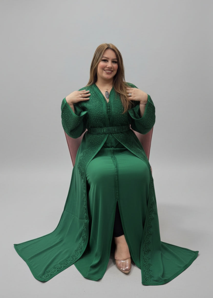 Woman wearing a green dress in a store setting
"caftan dress"
"women's caftan"
"kaftan"
"cotton caftan"
"caftan moroccan"
"moroccan caftan"
"men's caftan"
"caftan for women"
"white caftan"
"blue caftan"
"what is caftan"
"caftan dresses"
"caftan men"
"silk caftan"
"vintage caftan"
"maxi dress"
"beach caftan"
"caftan maxi dress"
"caftan for men"
"what is a caftan"
"caftan cover up"
"kaftan dress"
"plus size caftan"
"caftan plus size"
"short caftan"
"linen caftan"
"womens caftan"
"caftan meaning"