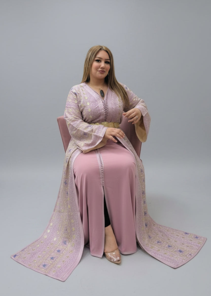 Woman in a pink traditional outfit sitting in a store.
"caftan dress"
"women's caftan"
"kaftan"
"cotton caftan"
"caftan moroccan"
"moroccan caftan"
"men's caftan"
"caftan for women"
"white caftan"
"blue caftan"
"what is caftan"
"caftan dresses"
"caftan men"
"silk caftan"
"vintage caftan"
"maxi dress"
"beach caftan"
"caftan maxi dress"
"caftan for men"
"what is a caftan"
"caftan cover up"
"kaftan dress"
"plus size caftan"
"caftan plus size"
"short caftan"
"linen caftan"
"womens caftan"
"caftan meaning"