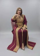 Woman wearing a maroon and gold traditional outfit on a gray background"kaftan dress""
"kaftan dresses"
"women kaftan"
"kaftan women"
"black kaftan"
"kaftan for women"
"men's kaftan"
"maxi kaftan"
"kaftan set"
"long kaftan"
"white kaftan"
"kaftan maxi dress"
"cotton kaftan"
"silk kaftan"
"blue kaftan"
"kaftan men"
"men kaftan"
"what is kaftan"
"caftan"
"moroccan kaftan"
"kaftan moroccan"
"kaftan top"
"embroidered kaftan"
"black kaftan dress"
"long kaftan dress"
"linen kaftan"
"abaya",11,"20%"
"kaftan abaya"