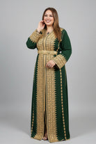 Woman wearing a green and gold traditional outfit in a clothing store."kaftan dress""
"kaftan dresses"
"women kaftan"
"kaftan women"
"black kaftan"
"kaftan for women"
"men's kaftan"
"maxi kaftan"
"kaftan set"
"long kaftan"
"white kaftan"
"kaftan maxi dress"
"cotton kaftan"
"silk kaftan"
"blue kaftan"
"kaftan men"
"men kaftan"
"what is kaftan"
"caftan"
"moroccan kaftan"
"kaftan moroccan"
"kaftan top"
"embroidered kaftan"
"black kaftan dress"
"long kaftan dress"
"linen kaftan"
"abaya"
"kaftan abaya"