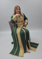 Woman wearing a green and gold traditional outfit in a store setting."kaftan dress""
"kaftan dresses"
"women kaftan"
"kaftan women"
"black kaftan"
"kaftan for women"
"men's kaftan"
"maxi kaftan"
"kaftan set"
"long kaftan"
"white kaftan"
"kaftan maxi dress"
"cotton kaftan"
"silk kaftan"
"blue kaftan"
"kaftan men"
"men kaftan"
"what is kaftan"
"caftan"
"moroccan kaftan"
"kaftan moroccan"
"kaftan top"
"embroidered kaftan"
"black kaftan dress"
"long kaftan dress"
"linen kaftan"
"abaya"
"kaftan abaya"