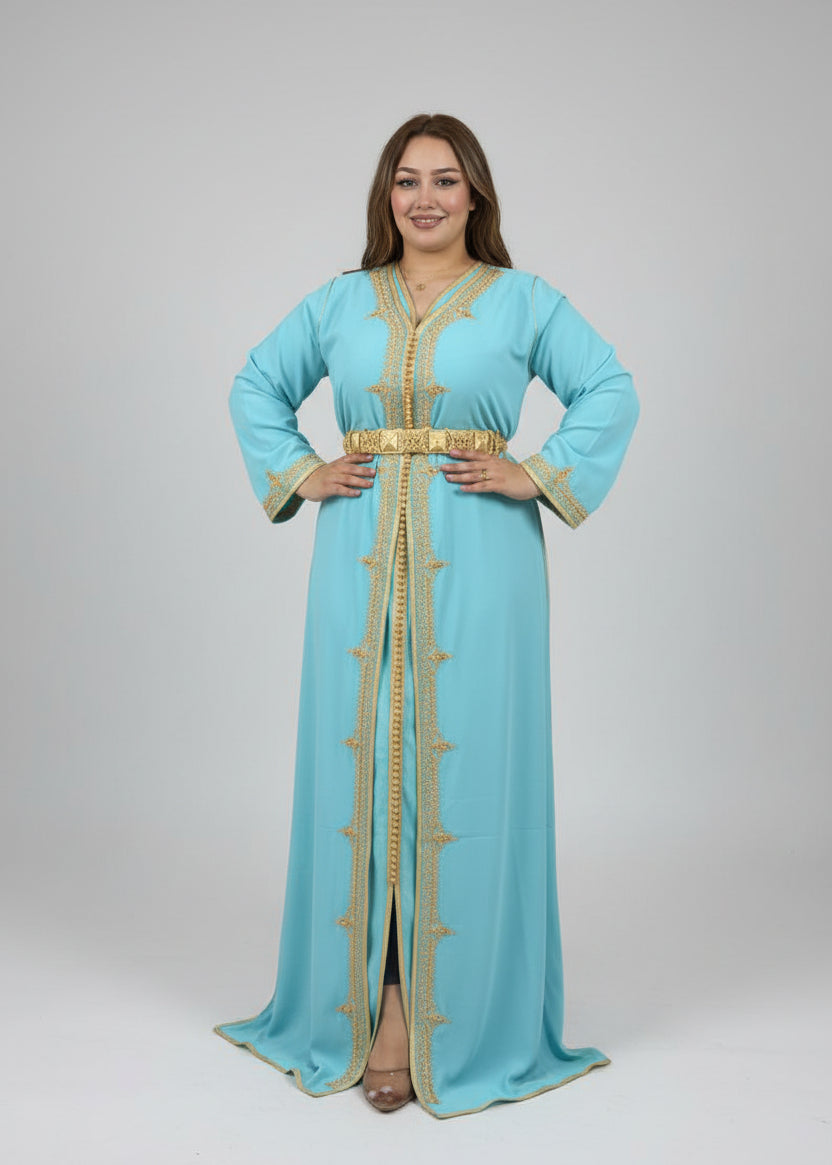 Woman wearing a light blue dress with gold accents in a clothing store.
"caftan dress"
"women's caftan"
"kaftan"
"cotton caftan"
"caftan moroccan"
"moroccan caftan"
"men's caftan"
"caftan for women"
"white caftan"
"blue caftan"
"what is caftan"
"caftan dresses"
"caftan men"
"silk caftan"
"vintage caftan"
"maxi dress"
"beach caftan"
"caftan maxi dress"
"caftan for men"
"what is a caftan"
"caftan cover up"
"kaftan dress"
"plus size caftan"
"caftan plus size"
"short caftan"
"linen caftan"
"womens caftan"