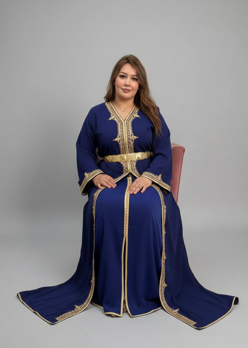 Woman in a blue dress with gold accents in a store setting "caftan dress"
"women's caftan"
"kaftan"
"cotton caftan"
"caftan moroccan"
"moroccan caftan"
"men's caftan"
"caftan for women"
"white caftan"
"blue caftan"
"what is caftan"
"caftan dresses"
"caftan men"
"silk caftan"
"vintage caftan"
"maxi dress"
"beach caftan"
"caftan maxi dress"
"caftan for men"
"what is a caftan"
"caftan cover up"
"kaftan dress"
"plus size caftan"
"caftan plus size"
"short caftan"
"linen caftan"
"womens caftan"
"caftan meaning"