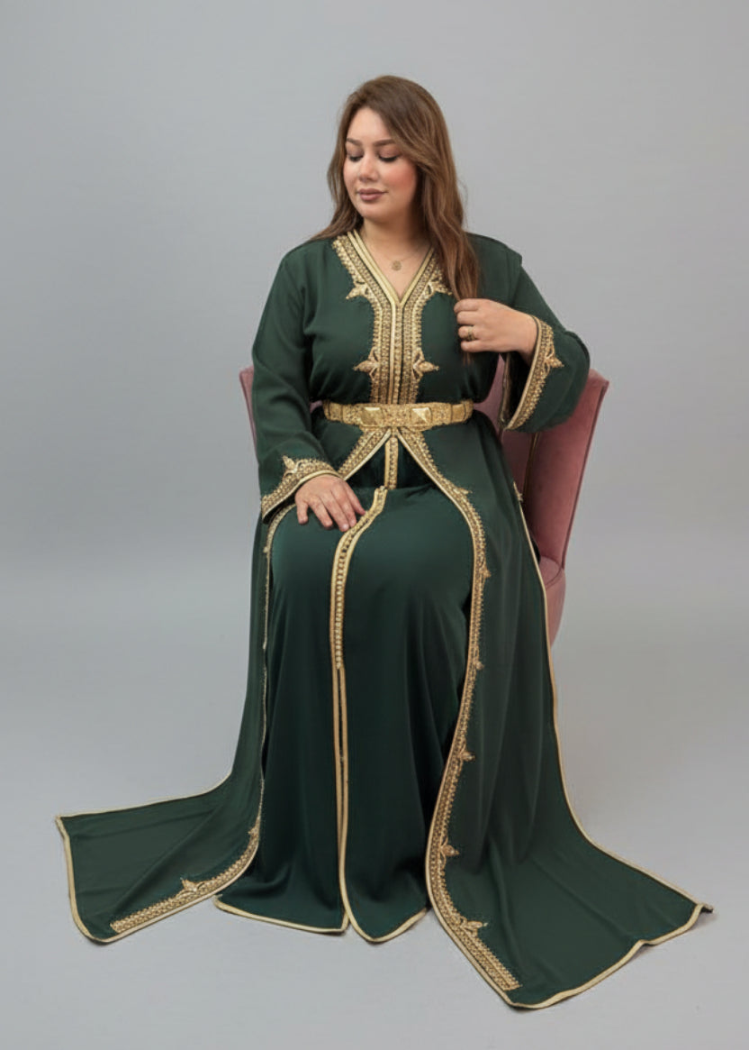 Woman wearing a green dress with gold embroidery in a store setting"caftan dress"
"women's caftan"
"kaftan"
"cotton caftan"
"caftan moroccan"
"moroccan caftan"
"men's caftan"
"caftan for women"
"white caftan"
"blue caftan"
"what is caftan"
"caftan dresses"
"caftan men"
"silk caftan"
"vintage caftan"
"maxi dress"
"beach caftan"
"caftan maxi dress"
"caftan for men"
"what is a caftan"
"caftan cover up"
"kaftan dress"
"plus size caftan"
"caftan plus size"
"short caftan"
"linen caftan"
"womens caftan"