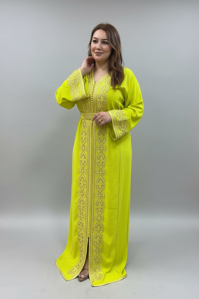 Woman wearing a bright yellow dress with intricate patterns in a clothing store.
"kaftan dress""
"kaftan dresses"
"women kaftan"
"kaftan women"
"black kaftan"
"kaftan for women"
"men's kaftan"
"maxi kaftan"
"kaftan set"
"long kaftan"
"white kaftan"
"kaftan maxi dress"
"cotton kaftan"
"silk kaftan"
"blue kaftan"
"kaftan men"
"men kaftan"
"what is kaftan"
"caftan"
"moroccan kaftan"
"kaftan moroccan"
"kaftan top"
"embroidered kaftan"
"black kaftan dress"
"long kaftan dress"
"linen kaftan"
"abaya"