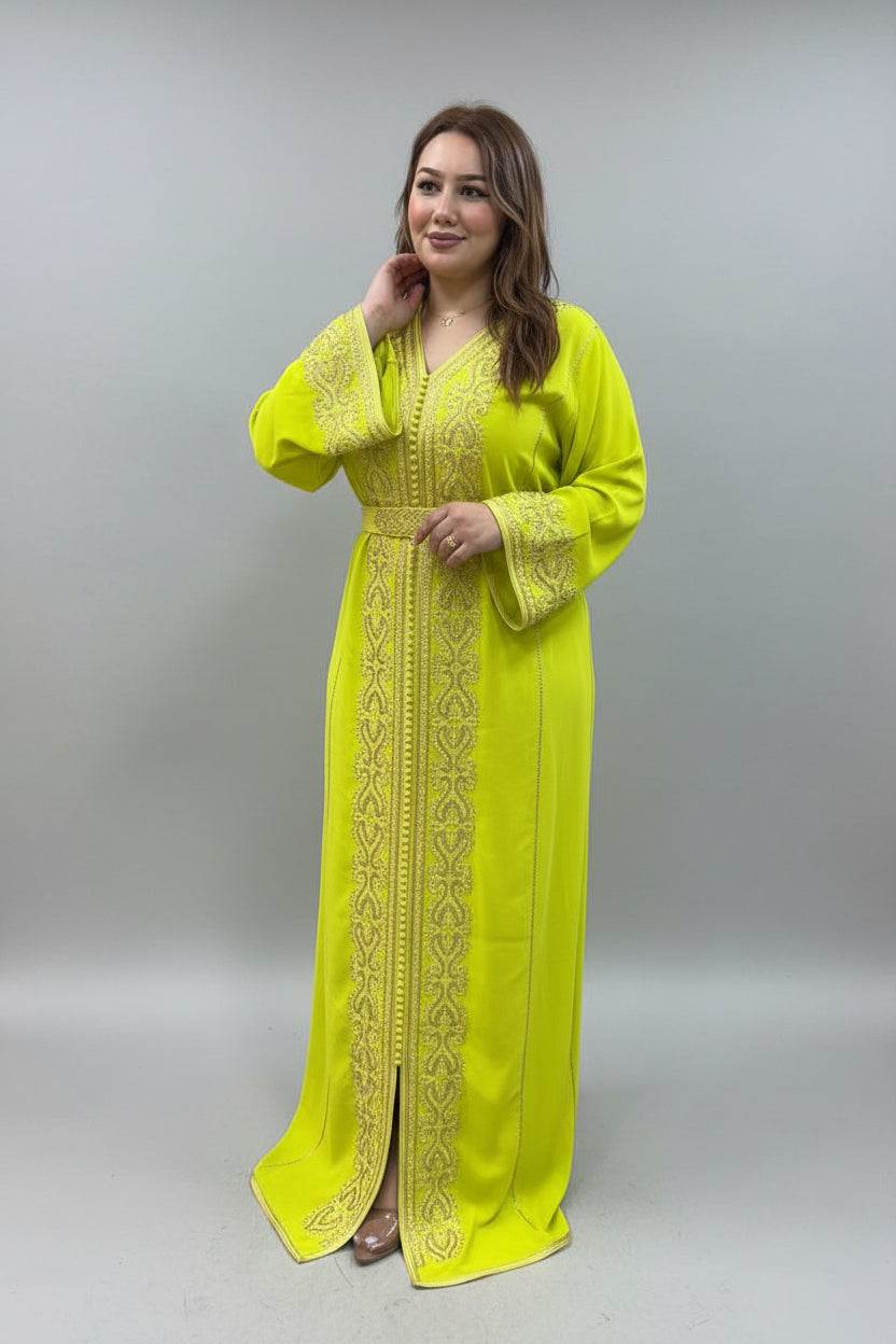 Woman wearing a bright yellow dress with intricate patterns in a clothing store.
"kaftan dress""
"kaftan dresses"
"women kaftan"
"kaftan women"
"black kaftan"
"kaftan for women"
"men's kaftan"
"maxi kaftan"
"kaftan set"
"long kaftan"
"white kaftan"
"kaftan maxi dress"
"cotton kaftan"
"silk kaftan"
"blue kaftan"
"kaftan men"
"men kaftan"
"what is kaftan"
"caftan"
"moroccan kaftan"
"kaftan moroccan"
"kaftan top"
"embroidered kaftan"
"black kaftan dress"
"long kaftan dress"
"linen kaftan"
"abaya"