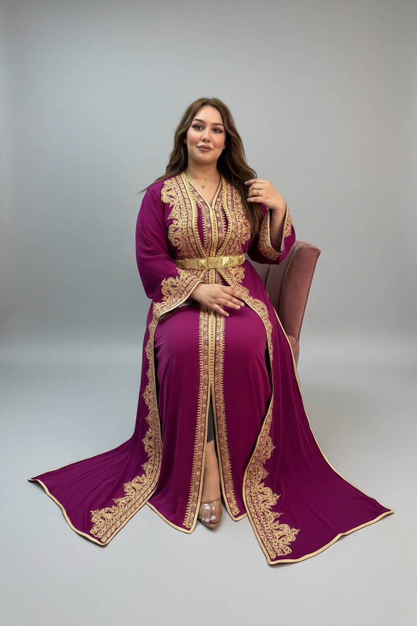 Woman wearing a purple dress with gold embroidery sitting on a chair against a plain background
"caftan dress"
"women's caftan"
"kaftan"
"cotton caftan"
"caftan moroccan"
"moroccan caftan"
"men's caftan"
"caftan for women"
"white caftan"
"blue caftan"
"what is caftan"
"caftan dresses"
"caftan men"
"silk caftan"
"vintage caftan"
"maxi dress"
"beach caftan"
"caftan maxi dress"
"caftan for men"
"what is a caftan"
"caftan cover up"
"kaftan dress"
"plus size caftan"
"caftan plus size"
"short caftan"
"linen cafta