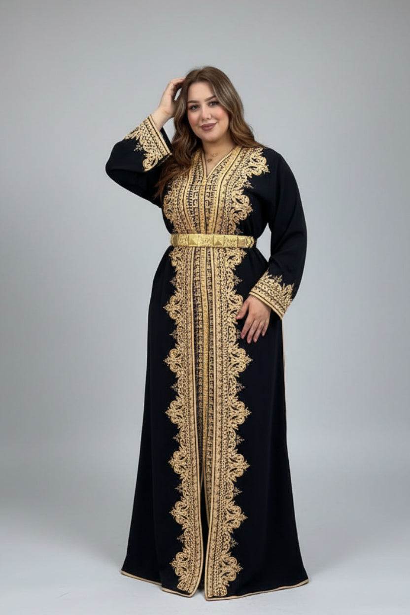 Woman wearing a black and gold embroidered Kaftan in a traditional caftan store .
