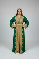 Woman wearing a green and gold dress in a clothing store.
"caftan dress"
"women's caftan"
"kaftan"
"cotton caftan"
"caftan moroccan"
"moroccan caftan"
"men's caftan"
"caftan for women"
"white caftan"
"blue caftan"
"what is caftan"
"caftan dresses"
"silk caftan"
"vintage caftan"
"maxi dress"
"beach caftan"
"caftan maxi dress"
"caftan for men"
"what is a caftan"
"caftan cover up"
"kaftan dress"
"plus size caftan"
"caftan plus size"
"short caftan"
"linen caftan"
"womens caftan"
"caftan meaning"
"caftan patter