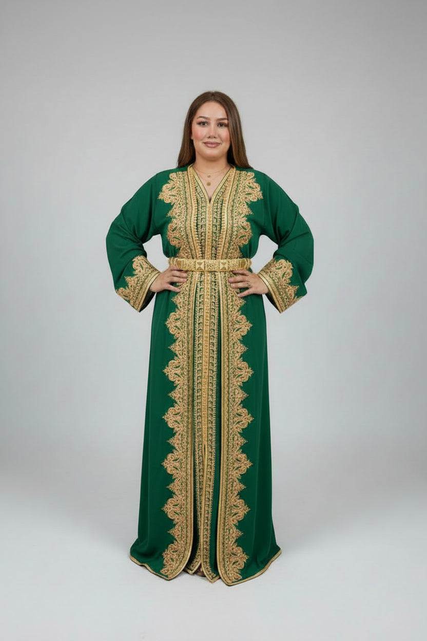 Woman wearing a green and gold dress in a Kaftan store.
