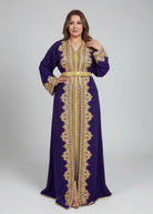 Woman wearing a purple dress with gold embroidery in a clothing store.
"caftan dress"
"women's caftan"
"kaftan"
"cotton caftan"
"caftan moroccan"
"moroccan caftan"
"caftan for women"
"white caftan"
"blue caftan"
"what is caftan"
"caftan dresses"
"silk caftan"
"vintage caftan"
"maxi dress"
"beach caftan"
"caftan maxi dress"
"caftan for men"
"what is a caftan"
"caftan cover up"
"kaftan dress"
"plus size caftan"
"caftan plus size"
"short caftan"
"linen caftan"
"womens caftan"
"caftan meaning"
"caftan pattern"