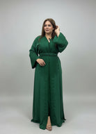 Woman in a green dress standing in a store with fabric displays.
"caftan dress"
"women's caftan"
"kaftan"
"cotton caftan"
"caftan moroccan"
"moroccan caftan"
"men's caftan"
"caftan for women"
"white caftan"
"blue caftan"
"what is caftan"
"caftan dresses"
"caftan men"
"silk caftan"
"vintage caftan"
"maxi dress"
"beach caftan"
"caftan maxi dress"
"caftan for men"
"what is a caftan"
"caftan cover up"
"kaftan dress"
"plus size caftan"
"caftan plus size"
"short caftan"
"linen caftan"
"womens caftan"
"caftan mean