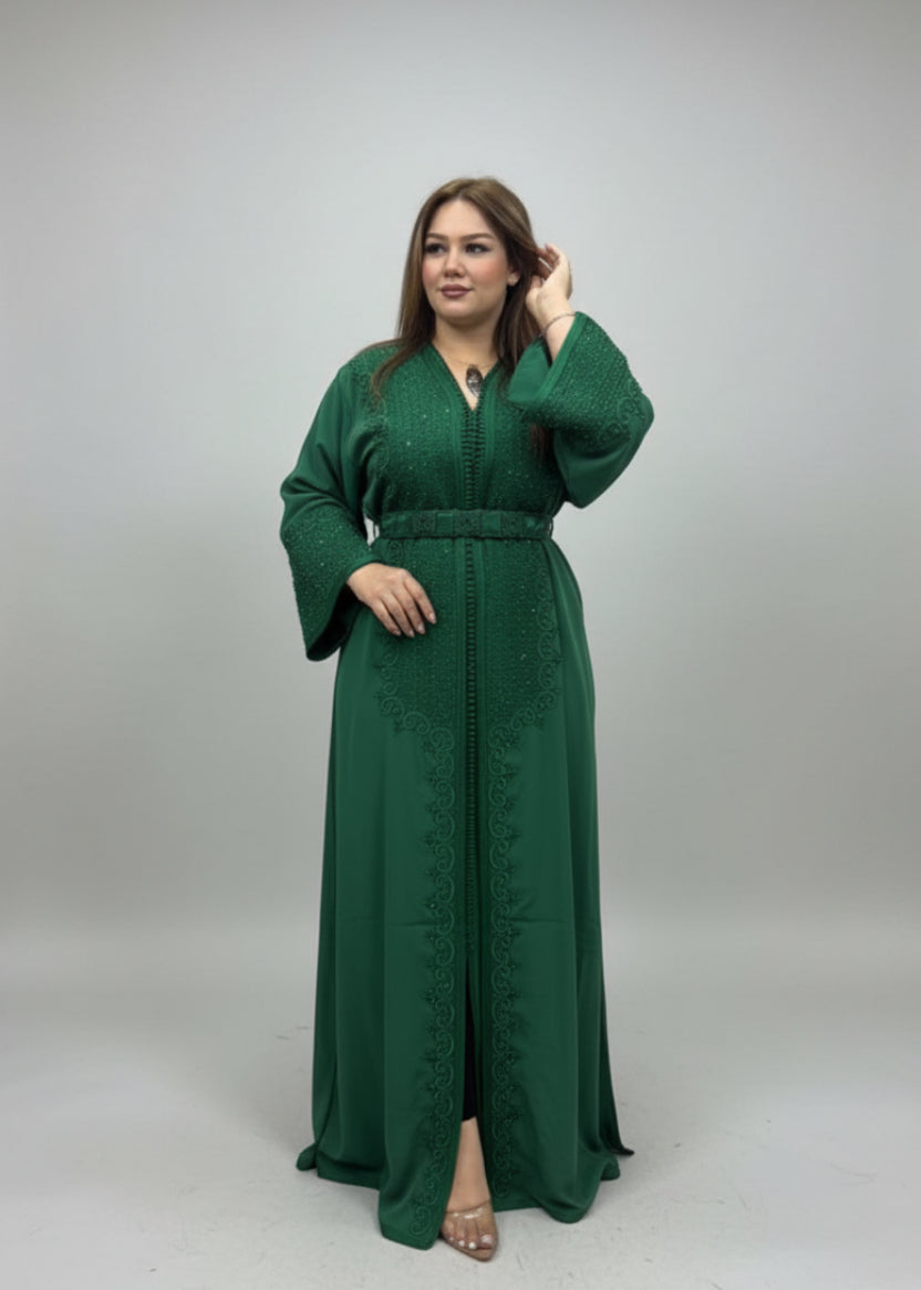 Woman in a green dress standing in a store with fabric displays.
"caftan dress"
"women's caftan"
"kaftan"
"cotton caftan"
"caftan moroccan"
"moroccan caftan"
"men's caftan"
"caftan for women"
"white caftan"
"blue caftan"
"what is caftan"
"caftan dresses"
"caftan men"
"silk caftan"
"vintage caftan"
"maxi dress"
"beach caftan"
"caftan maxi dress"
"caftan for men"
"what is a caftan"
"caftan cover up"
"kaftan dress"
"plus size caftan"
"caftan plus size"
"short caftan"
"linen caftan"
"womens caftan"
"caftan mean