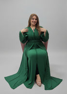 Woman wearing a green dress in a store setting
"caftan dress"
"women's caftan"
"kaftan"
"cotton caftan"
"caftan moroccan"
"moroccan caftan"
"men's caftan"
"caftan for women"
"white caftan"
"blue caftan"
"what is caftan"
"caftan dresses"
"caftan men"
"silk caftan"
"vintage caftan"
"maxi dress"
"beach caftan"
"caftan maxi dress"
"caftan for men"
"what is a caftan"
"caftan cover up"
"kaftan dress"
"plus size caftan"
"caftan plus size"
"short caftan"
"linen caftan"
"womens caftan"
"caftan meaning"