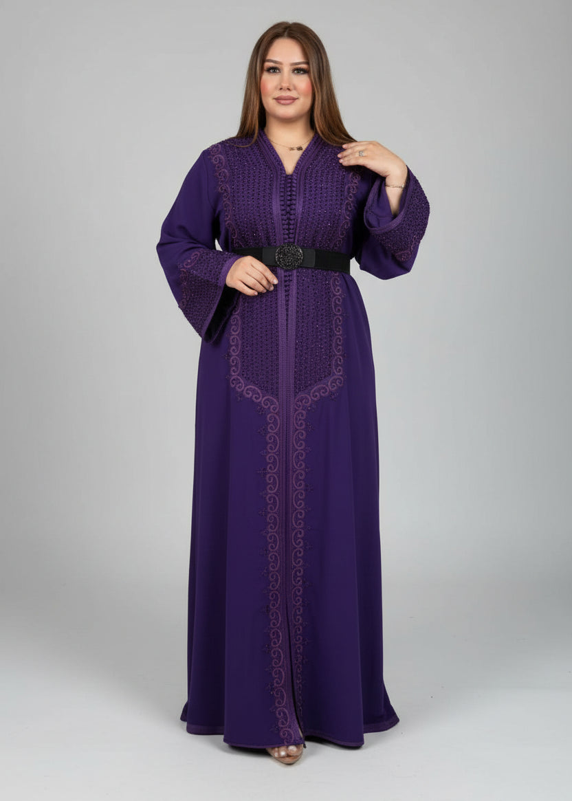 Woman wearing a purple dress with intricate designs on a gray background "kaftan dress""
"kaftan dresses"
"women kaftan"
"kaftan women"
"black kaftan"
"kaftan for women"
"men's kaftan"
"maxi kaftan"
"kaftan set"
"long kaftan"
"white kaftan"
"kaftan maxi dress"
"cotton kaftan"
"silk kaftan"
"blue kaftan"
"kaftan men"
"men kaftan"
"what is kaftan"
"caftan"
"moroccan kaftan"
"kaftan moroccan"
"kaftan top"
"embroidered kaftan"
"black kaftan dress"
"long kaftan dress"
"linen kaftan"
"abaya"
"kaftan abay