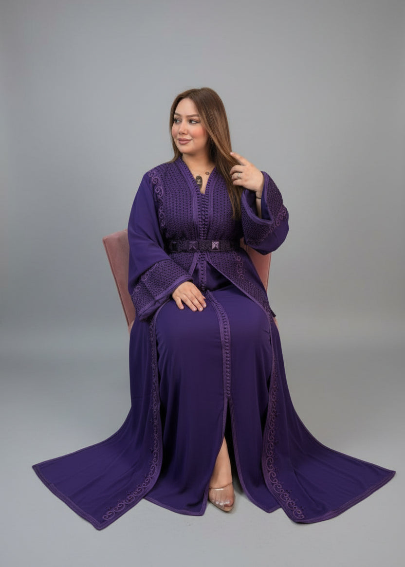 Woman wearing a purple outfit in a fabric store "kaftan dress""
"kaftan dresses"
"women kaftan"
"kaftan women"
"black kaftan"
"kaftan for women"
"men's kaftan"
"maxi kaftan"
"kaftan set"
"long kaftan"
"white kaftan"
"kaftan maxi dress"
"cotton kaftan"
"silk kaftan"
"blue kaftan"
"kaftan men"
"men kaftan"
"what is kaftan"
"caftan"
"moroccan kaftan"
"kaftan moroccan"
"kaftan top"
"embroidered kaftan"
"black kaftan dress"
"long kaftan dress"
"linen kaftan"
"abaya",11,"20%"
"kaftan abaya"
"beach kaftan"

