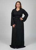 Woman in a black outfit standing in a clothing store with colorful fabrics in the background.
"kaftan dress""
"kaftan dresses"
"women kaftan"
"kaftan women"
"black kaftan"
"kaftan for women"
"men's kaftan"
"maxi kaftan"
"kaftan set"
"long kaftan"
"white kaftan"
"kaftan maxi dress"
"cotton kaftan"
"silk kaftan"
"blue kaftan"
"kaftan men"
"men kaftan"
"what is kaftan"
"caftan"
"moroccan kaftan"
"kaftan moroccan"
"kaftan top"
"embroidered kaftan"
"black kaftan dress"
"long kaftan dress"
"linen kaftan"
"abaya"