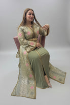 Woman in a traditional outfit with floral patterns sitting on a chair against a plain background
"caftan dress"
"women's caftan"
"kaftan"
"cotton caftan"
"caftan moroccan"
"moroccan caftan"
"men's caftan"
"caftan for women"
"white caftan"
"blue caftan"
"what is caftan"
"caftan dresses"
"caftan men"
"silk caftan"
"vintage caftan"
"maxi dress"
"beach caftan"
"caftan maxi dress"
"caftan for men"
"what is a caftan"
"caftan cover up"
"kaftan dress"
"plus size caftan"
"caftan plus size"
"short caftan"