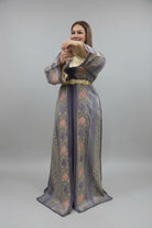 Woman wearing a patterned dress on a plain background
"caftan dress"
"women's caftan"
"kaftan"
"cotton caftan"
"caftan moroccan"
"moroccan caftan"
"men's caftan"
"caftan for women"
"white caftan"
"blue caftan"
"what is caftan"
"caftan dresses"
"caftan men"
"silk caftan"
"vintage caftan"
"maxi dress"
"beach caftan"
"caftan maxi dress"
"caftan for men"
"what is a caftan"
"caftan cover up"
"kaftan dress"
"plus size caftan"
"caftan plus size"
"short caftan"
"linen caftan"
"womens caftan"
"caftan meaning"