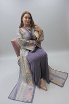 Woman sitting in a store wearing a patterned dress with a mirror 
"caftan dress"
"women's caftan"
"kaftan"
"cotton caftan"
"caftan moroccan"
"moroccan caftan"
"men's caftan"
"caftan for women"
"white caftan"
"blue caftan"
"what is caftan"
"caftan dresses"
"caftan men"
"silk caftan"
"vintage caftan"
"maxi dress"
"beach caftan"
"caftan maxi dress"
"caftan for men"
"what is a caftan"
"caftan cover up"
"kaftan dress"
"plus size caftan"
"caftan plus size"
"short caftan"
"linen caftan"
"womens caftan"
