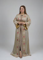 Woman wearing a floral long dress against a plain background 
"caftan dress"
"women's caftan"
"kaftan"
"cotton caftan"
"caftan moroccan"
"moroccan caftan"
"men's caftan"
"caftan for women"
"white caftan"
"blue caftan"
"what is caftan"
"caftan dresses"
"caftan men"
"silk caftan"
"vintage caftan"
"maxi dress"
"beach caftan"
"caftan maxi dress"
"caftan for men"
"what is a caftan"
"caftan cover up"
"kaftan dress"
"plus size caftan"
"caftan plus size"
"short caftan"
"linen caftan"
"womens caftan"
"caftan meaning
