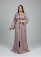 Woman in a patterned dress standing in front of a rack of fabric in a store.
"caftan dress"
"women's caftan"
"kaftan"
"cotton caftan"
"caftan moroccan"
"moroccan caftan"
"men's caftan"
"caftan for women"
"white caftan"
"blue caftan"
"what is caftan"
"caftan dresses"
"caftan men"
"silk caftan"
"vintage caftan"
"maxi dress"
"beach caftan"
"caftan maxi dress"
"caftan for men"
"what is a caftan"
"caftan cover up"
"kaftan dress"
"plus size caftan"
"caftan plus size"
"short caftan"
"linen caftan"
"womens caftan"